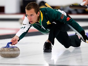 Skip Brendan Bottcher makes a shot during the Direct Horizontal Drilling Fall Classic at the Crestwood Curling Club, 14317 - 96 Ave., in Edmonton Alta. on Saturday Oct. 10, 2015. David Bloom/Edmonton Sun/Postmedia Network