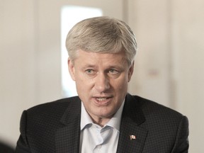 Prime Minister Stephen Harper speaks with with David Akin in Richmond, B.C., October 9, 2015. Nick Procaylo/Vancouver Province/Postmedia Network