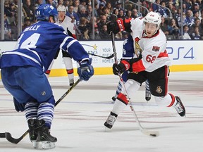 TORONTO, ON - OCTOBER 10: Mike Hoffman #68 of the Ottawa Senators fires a shot against the Toronto Maple Leafs during an NHL game at the Air Canada Centre on October 10, 2015 in Toronto, Ontario, Canada.   Claus Andersen/Getty Images/AFP
== FOR NEWSPAPERS, INTERNET, TELCOS & TELEVISION USE ONLY ==