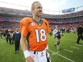 Denver Broncos quarterback Peyton Manning (18) after the game against the Minnesota Vikings at Sports Authority Field at Mile High. The Broncos won 23-20. Mandatory Credit: Chris Humphreys-USA TODAY Sports