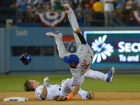 New York Mets shortstop Ruben Tejada, right, collides with Los Angeles Dodgers second baseman Chase Utley at second base during the seventh inning in game two of the NLDS at Dodger Stadium in Los Angeles, Oct 10, 2015. (Jayne Kamin-Oncea-USA TODAY Sports)
