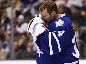 Toronto Maple Leafs'  James Reimer hangs his head after letting in the third goal against the Ottawa Senators at the Air Canada Centre in Toronto on Oct. 10, 2015. (Craig Robertson/Toronto Sun/Postmedia Network)