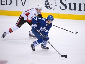 Toronto Maple left winger James van Riemsdyk moves past Ottawa Senators right winger Bobby Ryan in overtime at the Air Canada Centre in Toronto on Oct. 10, 2015. (Peter Llewellyn/USA TODAY Sports)