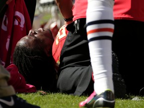 Kansas City Chiefs running back Jamaal Charles (25) lies injured on the field during the second half of an NFL football game against the Chicago Bears in Kansas City, Mo., Sunday, Oct. 11, 2015. (AP Photo/Charlie Riedel)