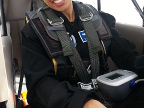 Dr. Shawna Pandya strapped into the aerobatic flight pre-simulation (parachute included).