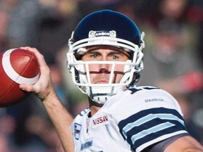 Toronto Argonauts quarterback Ricky Ray throws a pass during second half CFL football action against the Alouettes in Montreal on November 2, 2014. THE CANADIAN PRESS/Graham Hughes