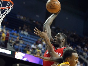 Raptors forward Anthony Bennett throws down a massive dunk on Robert Upshaw of the Lakers last week. Bennett has a lot to prove this year after being dumped by the T-Wolves. (AP)