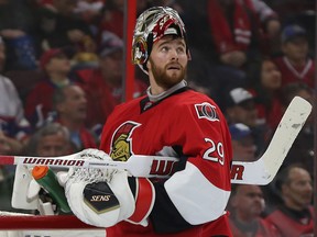 The Ottawa Senators took part in their home opener against the Montreal Canadiens at Canadian Tire Centre in Ottawa Ontario Sunday Oct 11, 2015. Ottawa Senators goalie Matthew O'Connor looks at the score board during second period Sunday.  Tony Caldwell/Ottawa Sun/Postmedia Network