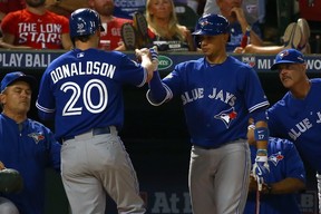 Josh Donaldson #20 of the Toronto Blue Jays reacts as he is