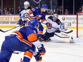 New York Islanders centre John Tavares (91) scores a goal on Winnipeg Jets goalie Ondrej Pavelec (31) during the second period at Barclays Center on Oct. 12, 2015 in Brooklyn, New York (Ed Mulholland-USA TODAY Sports)