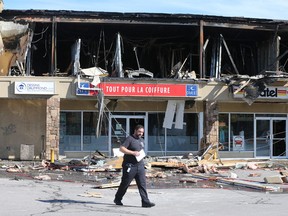 Gatineau police investigate a suspicious fire at a tanning salon at 151 Greber Blvd. in Gatineau on Monday Oct 12, 2015.
Tony Caldwell/Ottawa Sun