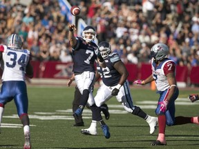 Toronto Argonauts quarterback Trevor Harris throws against the Montreal Alouettes during the second half of their CFL football game in Montreal, October 12, 2015. (REUTERS/Christinne Muschi)