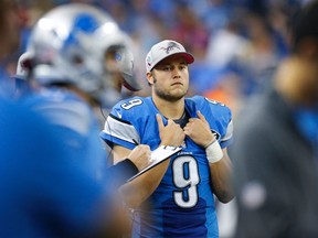 Detroit Lions quarterback Matthew Stafford (9) walks on the sidelines during the second half of an NFL football game against the Arizona Cardinals, Sunday, Oct. 11, 2015, in Detroit. (AP Photo/Rick Osentoski)