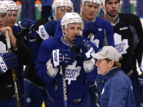 Leafs coach Mike Babcock gives some instruction during Toronto Maple Leafs practice in Toronto on Monday October 12, 2015. Craig Robertson/Toronto Sun/Postmedia Network