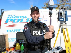 Const. Greg Smith, senior collision reconstructionist with the Kingston Police, at police headquarters in Kingston, Ont. on Saturday October 10, 2015. Steph Crosier/Kingston Whig-Standard/Postmedia Network