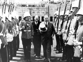 (l to r) Guard Captain Ken Clarke, MP Norman Rogers, Prime Minister Mackenzie King during Aug. 1, 1938 visit to the fort.