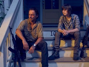 Andrew Lincoln, left, plays Rick Grimes and Chandler Riggs plays Carl in AMC's "The Walking Dead." (AMC photo)