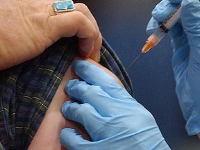 A flu shot is administered in Barre, Vt., Nov.18, 2004. It's official. Flu season is in full swing in many parts of Canada. And virtually all the viruses circulating at this point are from the H3N2 family, which is unfortunate. (THE CANADIAN PRESS/AP/Toby Talbot)