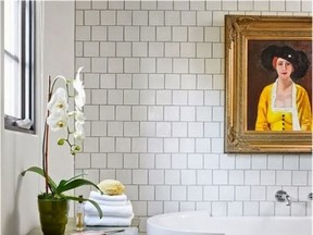 Adding some unexpected artwork to a bathroom is the ultimate way to make it feel simultaneously lively and luxe.