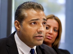 Mohamed Fahmy attends a news conference with his wife Marwa Omara, hosted by Canadian Journalists for Free Expression (CJFE) at the Ryerson University School of Journalism in Toronto October 13, 2015. (REUTERS/Fred Thornhill)