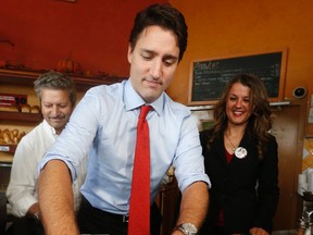 Liberal leader Justin Trudeau served up custard tarts on Tuesday in the Toronto area. He has yet to serve up a coherent approach to health care, Tom Brodbeck writes. (Jack Boland/Postmedia Network photo)