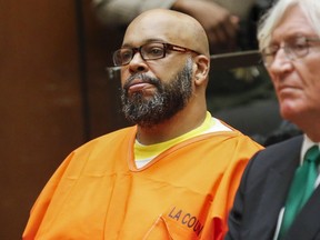 Defendant Marion "Suge" Knight attends a hearing with attorney Thomas Mesereau in his murder case in Los Angeles, California in this July 7, 2015, file photo.  A judge on October 13, 2015, ordered one time rap mogul Marion "Suge" Knight and comedian Katt Williams to stand trial on robbery charges in connection with the theft of a camera from a paparazzi photographer in upscale Beverly Hills. (REUTERS/Patrick T. Fallon/Files)
