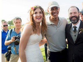 Stephanie Mirkin (L) and Brian Tobe (R) are pictured with U.S. President Obama Obama during their wedding at The Lodge at Torrey Pines in La Jolla, California Oct. 11, 2015.   REUTERS/Jeff Youngren/Handout