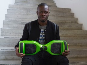 Tobi Oluwole, a fourth year student at Carleton University, had two of his hoverboards robbed at a knife point. He's gotten one of the boards back, thanks to his friends on social media.(Julienne Bay/Ottawa Sun)