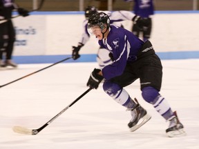 Western Mustang Spenser Cobalt skates during practice at Western University?s Thompson arena on Tuesday. (DEREK RUTTAN, The London Free Press)