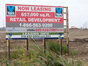 A sign marks the site on the northwest corner of Wonderland and Exeter roads where York Commercial Development plans to build a major commercial plaza in London. (CRAIG GLOVER, The London Free Press)