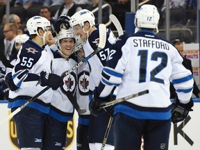 The Jets celebrate Nikolaj Ehlers first career NHL goal in the first period of Tuesday's 4-1 in New York