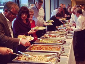 Attendees sample the buffet at last year's Locally Lambton Dinner. The United-Way of Sarnia-Lambton fundraiser typically raises $7,000 to $8,000, an organizer says, and is set this year for Oct. 24. Handout/Sarnia Observer/Postmedia Network
