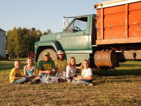 Withrow, Alberta area farmer Roger Bott and his family in an undated Facebook photo. Three sisters from the central Alberta family died after falling into a canola truck on the family farm on Tuesday, Oct. 13, 2015.