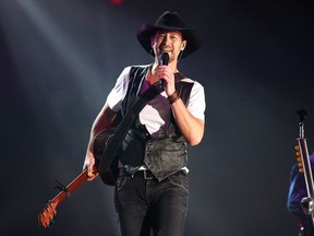 Canadian country artist Paul Brandt performs to a crowd of about 4,000 last night at Sudbury Community Arena in Sudbury, Ont. on Tuesday, October 13, 2015. Brandt is on tour with fellow Canadian music star Dean Brody on their 2015 Road Trip tour. Gino Donato/Sudbury Star/Postmedia Network