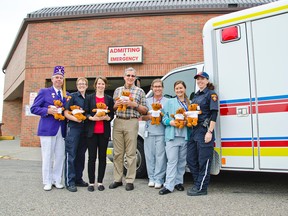 The Elks donated 50 stuffed teddy bears to the hospital and emergency services on Oct. 7, 2015. From left to right: Ken Neumann of the Elks, Kate Feist from PCES, medical student Laura Richardson, Dr. Steyn De Wet of the clinic, Sandra Lewis of the hospital, Kelsey Green from the hospital and Sariah Brasnett from PCES. John Stoesser photos/Pincher Creek Echo.
