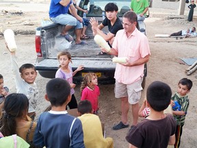 Chatham native Sean Moore is pictured in Iraq earlier this year doing some mission work. He is returning to the war-torn country on Nov. 13, 2015 with Chatham resident Jeff Bultje to help 1,300 families living in an abandoned village that has become a make-shift refugee camp. (Handout/Chatham Daily News/Postmedia Network)