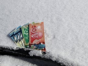 On-street winter parking will cost $140 a month starting in November. (Ottawa Sun Illustration)