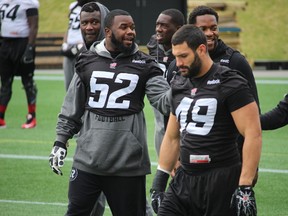 Ottawa RedBlacks defensive end Shawn Lemon (52) has never let rejection get him down. He just moves along with a positive attitude. TIM BAINES/OTTAWA SUN