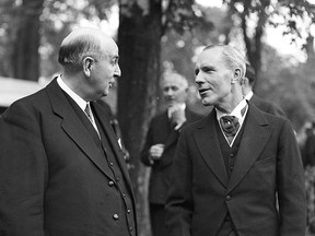 Photo by George Lilley, courtesy of Queen’s University Archives.
J.B. Hanson, left, leader of the federal Conservative Party and leader of the opposition, speaks with Kingston member of Parliament Angus L. Macdonald at an event at Queen’s Universary  on June 7, 1941. Macdonald was a wartime cabinet minister in Mackenzie King’s government. He was brought to Kingston after the death of Norman Rogers and ran for the seat unopposed. Before coming to Kingston, he was the premier of Nova Scotia from 1933 to 1940, then again after he left his federal Kingston seat, from 1945 until his death in 1954. There’s a bridge in the Halifax harbour named after Macdonald. When he came to Kingston, he had no ties to the city or area. He came by the request of the prime minister, who wanted to keep the seat in the Liberal party.