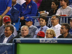 Toronto Councillor Rob Ford behind home plate as the Toronto Blue Jays battle against the Texas Rangers in game five of the American League Division Series in Toronto on Wednesday October 14, 2015. (Dave Abel/Toronto Sun)