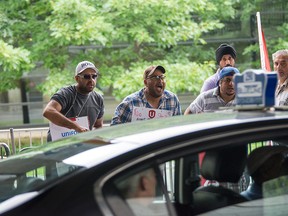 Ottawa cab drivers protest outside the airport in August. (DANI-ELLE DUBE/Ottawa Sun)