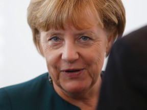 German Chancellor Angela Merkel arrives for a Christian Democratic Union (CDU) party board meeting in Berlin, Germany October 12, 2015. REUTERS/Hannibal Hanschke