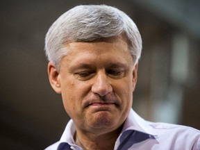 Prime Minister and Conservative leader Stephen Harper speaks at a campaign event at J.P. Bowman, a tool and die facility, in Brantford, Ontario, October 14, 2015.  (REUTERS/Mark Blinch)