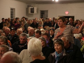 Wolfe Island resident Angie Vaughan asks a question at Wednesday's meeting about the status of the Wolfe Islander III  (Elliot Ferguson/The Whig-Standard)