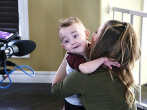 John Lappa/Sudbury Star
Taylum Lamoureux and his mom, Desiree, play at their home in Greater Sudbury on Oct. 14 as a film crew captured a day in the boy's life. Taylum, a patient of Sick Kids Hospital in Toronto, was born with a rare kidney disease and underwent a kidney transplant in May.