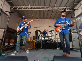 Toronto Blue Jays fans celebrate Summer Friday Fan Festival before the Detroit Tigers and Jays with a concert by Saskatchewan super band The Sheepdogs Friday August 28, 2015. Jack Boland/Postmedia Network