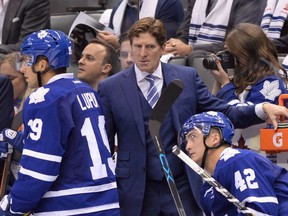 Toronto Maple Leafs head coach Mike Babcock stands behind the bench as his team plays the Montreal Canadiens during second period NHL action in Toronto on Wednesday, Oct. 7, 2015. (THE CANADIAN PRESS/Frank Gunn)