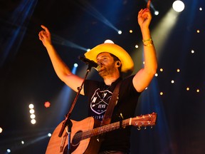 Country music star Dean Brody performs at Revolution Place in Grande Prairie, Alta., on Oct. 3 Brody is on tour with Paul Brandt for their Road Trip tour, which makes a stop in Kingston on Sunday. (Svjetlana Mlinarevic/Postmedia Network)