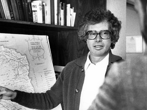 Ken Taylor, the Canadian ambassador to Iran, briefs a reporter on the current conditions in Iran one week before leaving Iran with six Americans in a 1980 file photo. Taylor, who sheltered six U.S. citizens during the 1979 Iranian hostage crisis, has died, says a family friend THE CANADIAN PRESS IMAGES/Peter Bregg