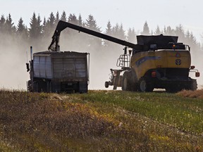 Heavy equipment works a field south of Hespero, Alta. FILE